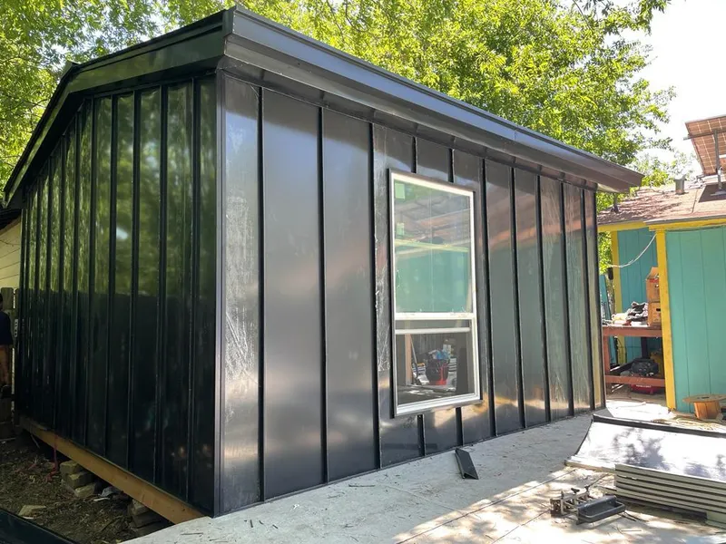 Black standing seam metal wall panels for Roof Inspection in Dearborn