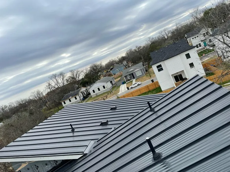 Standing seam metal roof panels with vents for Skylight Repair in Dearborn
